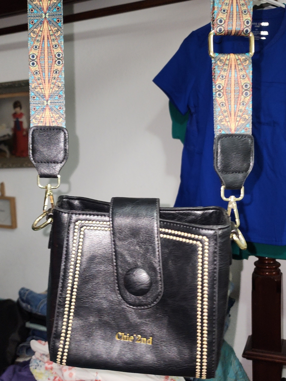 Black Leather Crossbody Bag with Decorative Strap
